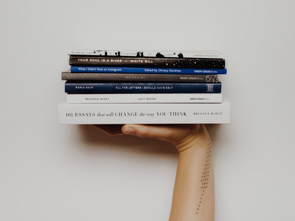 Hand holding books